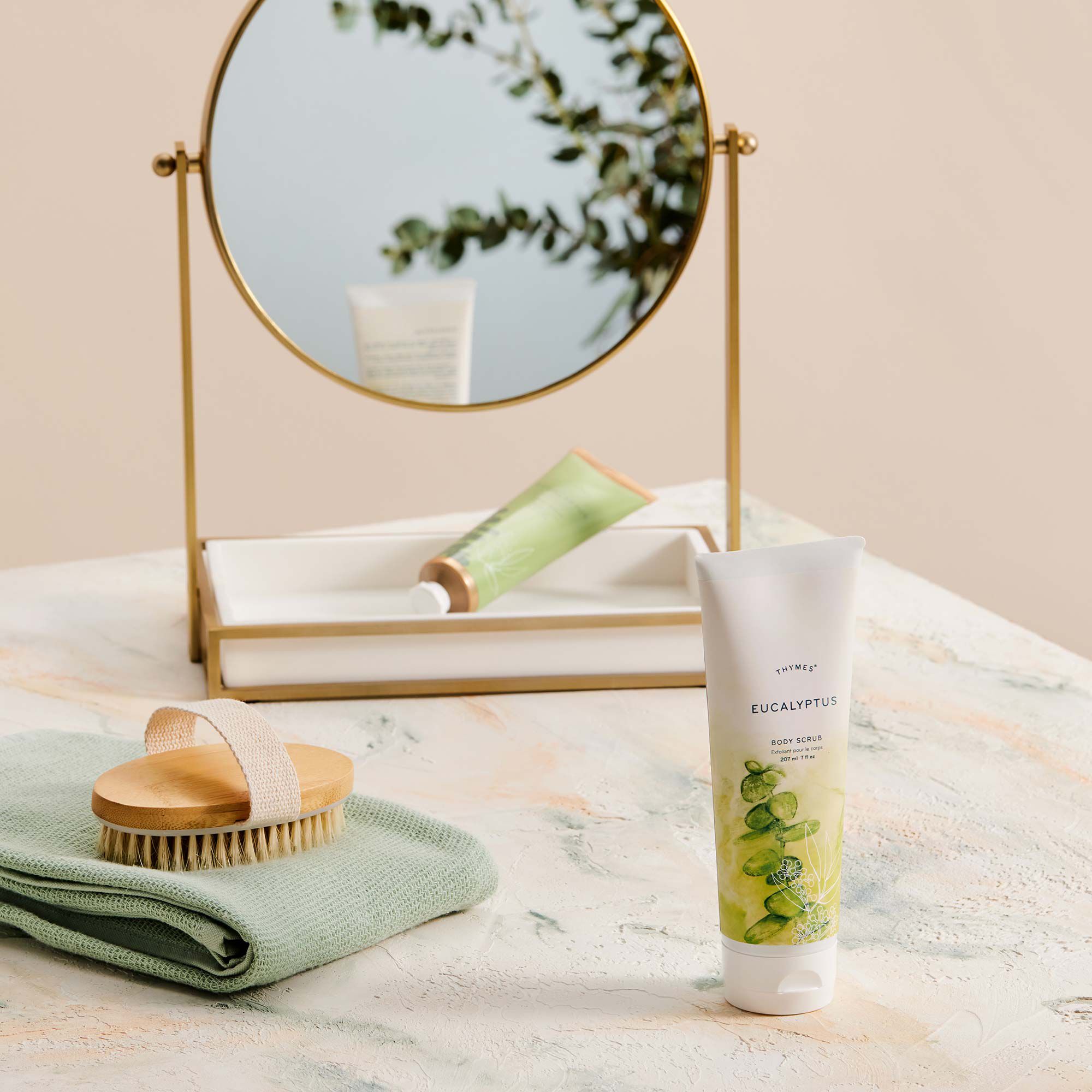 eucalyptus-body-scrub-hand-creme-textured-surface-mirror-min.jpg