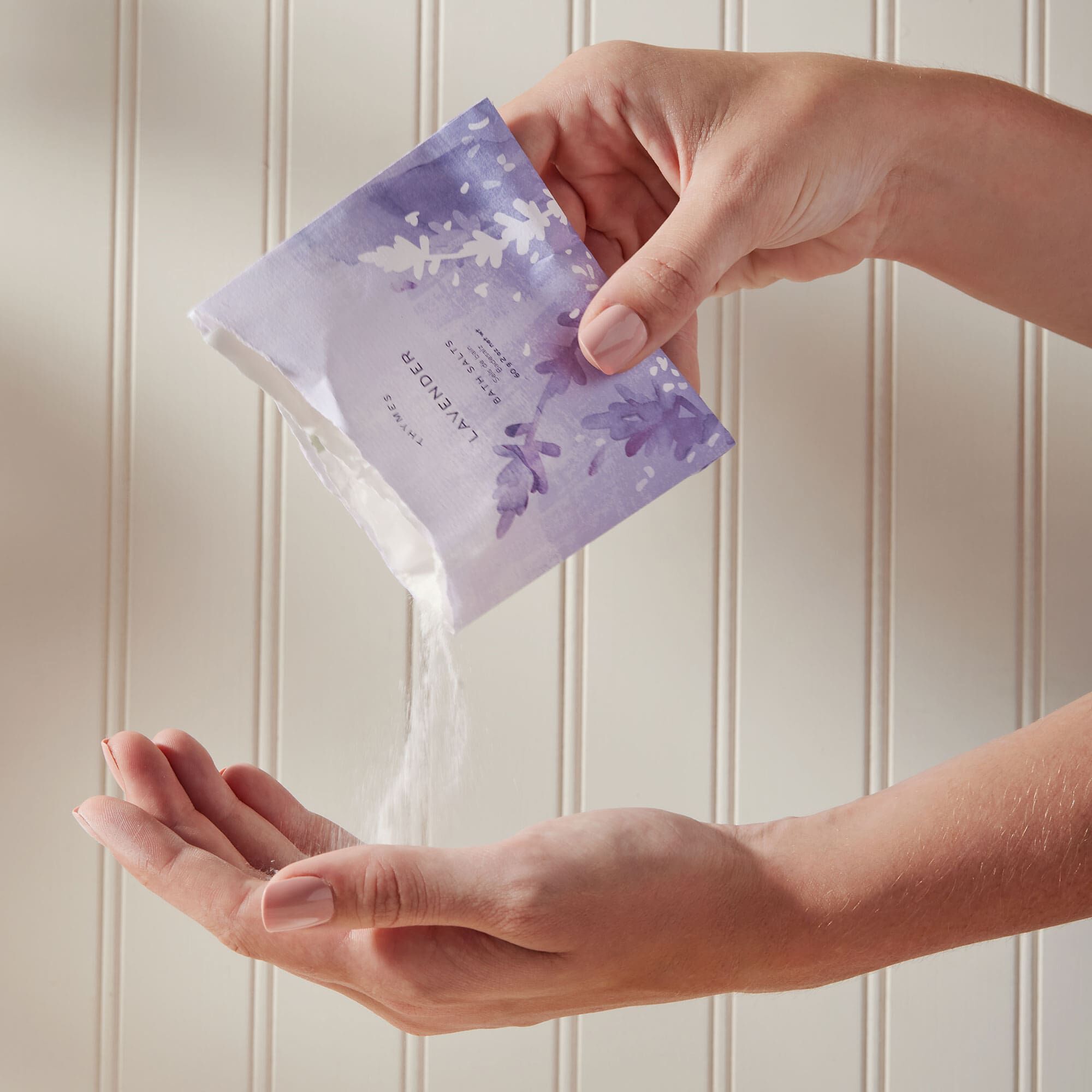 lavender-bath-salts-being-poured-into-hand.jpg