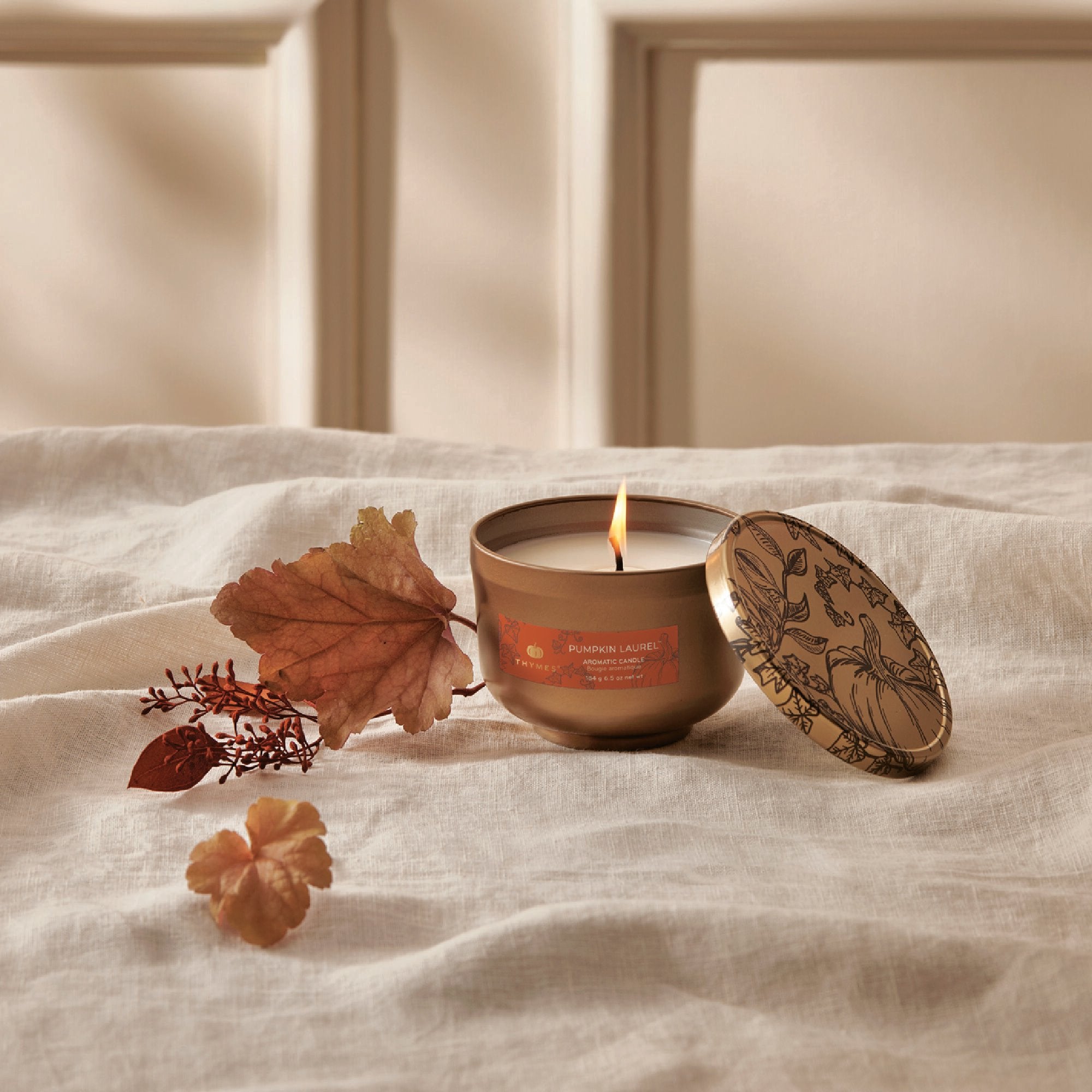 thymes-hy23-pumpkin-laurel-candle-tin-web-alt-1.jpg
