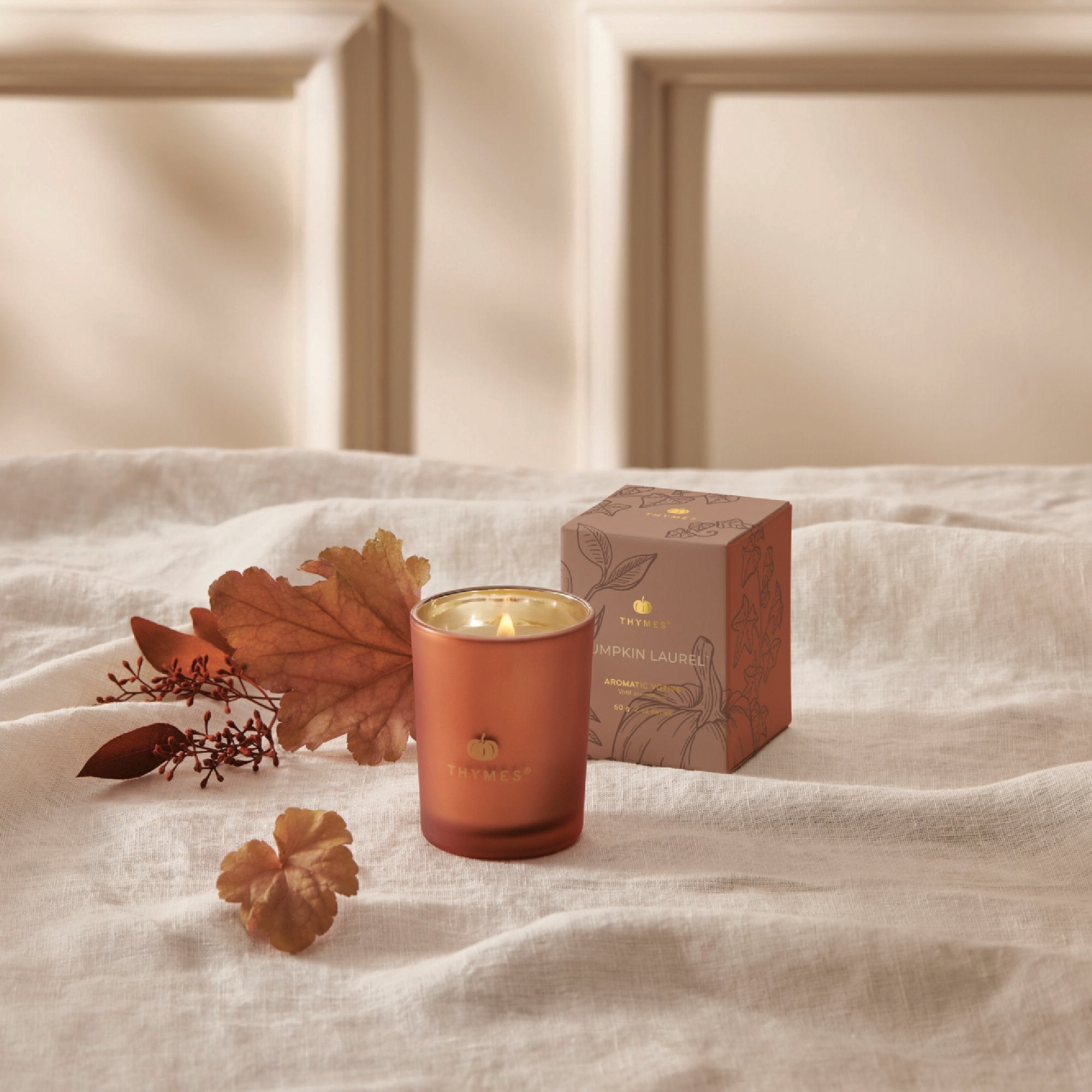 thymes-hy23-pumpkin-laurel-votive-web-alt-1.jpg