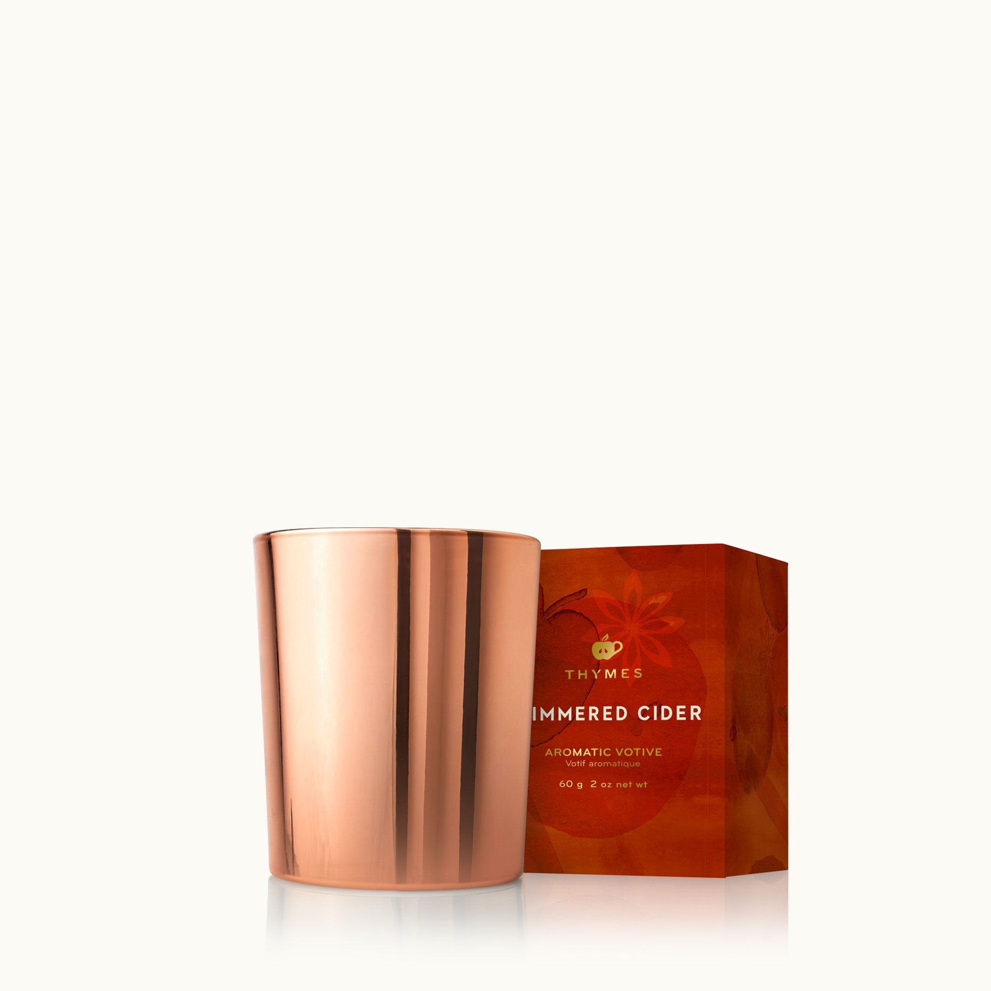 thymes-simmered-cider-votive-candle-0530730207.jpg
